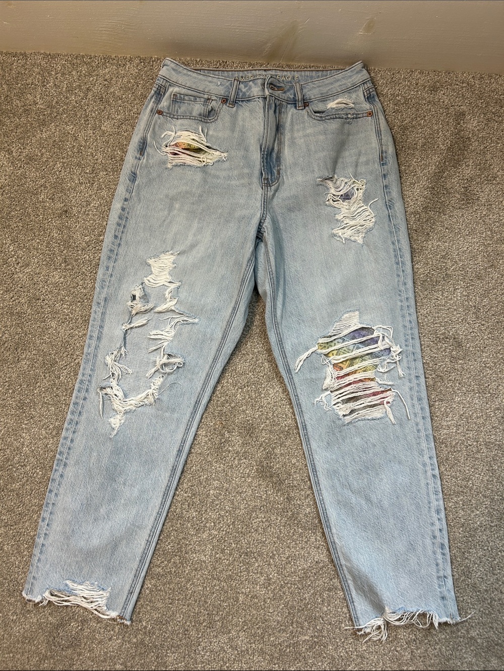 American Eagle high waisted Light Blue Mom Jeans with rips and distressing